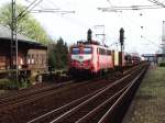 140 010-0 mit Gterzug nach Emden auf Bahnhof Salzbergen am 21-04-2000.