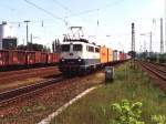 140 463-1 mit Gterzug auf Bahnhof Lengerich am 2-6-2000.