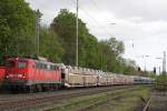 DB Cargo 140 491 am 12.4.11 mit einem langen Autozug bei der Durchfahrt durch Ratingen-Lintorf.