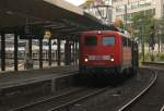 DB 140 821-0 mit Autotransportzug in Wuppertal Hbf, Oktober 2012.