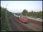 Ein Autotransportzug mit 140 861 fuhr am 30.09.2006 durch den Bahnhof Frankfurt am Main-West.