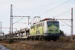 140 002  Sunrail  mit leeren Autotransportzug in Dedensen G�mmer, Februar 2017.