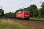 140 327-8 mit leeren Rungenwagen in Fahrtrichtung Eystrup. Aufgenommen am 23.07.2015 bei Wahnebergen.