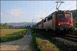 Die Gremberger 140 871 der  RAILION Montan  und eine Schwesterlok bringen den KC 48700 Grokrotzenburg-Rotterdamm Maasvlakte bei Hohenlimburg Richtung Kste. (06.10.07)