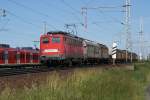 140 450-8 mit einem gemischten Gterzug am Haken am 16.06.2010 bei Dedensnen/Gmmer.