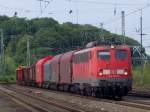 Die 140 501-8 schlich am 22.07.2010 mit einem gemischten Gterzug durch Kln West.