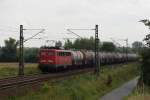 140 184-3 mit einem Kesselwagenzug in Nauheim (bei Gro Gerau) am 03.08.2010