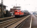 Heute drei verschiedene Farben der BR 140: 140 293-2 mit einem Gterzug auf Bahnhof Hasbergen am 5-2-2000.