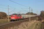 Mit einem Containerzug von Continental fhrt 140 528-1 durch Magdeburg Diesdorf in Richtung Braunschweig. Fotografiert am 19.03.2011. 