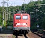 140 440 bei der einfahrt mit ihrem Gterzug in Dresden Cotta.