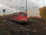 140 107-4 verlsst mit einem Kohlependel den Bahnhof Recklinghausen Sd. 15.11.06