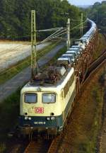 140 676 mit Gterzug Richtung Bremen am 10.09.1999 in Linsburg