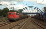 140537 verläßt mit ihrem Tankwagenzug das Ausweichgleis in der Einfahrt des Bahnhof Salzbergen, um am 23.5.2014 weiter in Richtung Emden zu fahren.