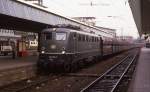 Mit einem Erzzug Richtung Ruhrgebiet rollt 140175 am 2.3.1988 durch den Hauptbahnhof Münster. 