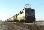 140 580 mit Gterzug Richtung Maschen am 24.12.1996 zwischen Jesteburg und Maschen Rbf