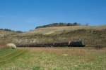 140 438 mit dem Henkelzug Richtung Würzburg bei Himmelstadt im Maintal am 10.4.2015.