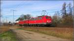 Lok 140 043 saust hier im Schlepp mit 232 543 am Hp Uebigau vorbei, gen Cottbus.