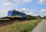 140 761-8 der EVB/MWB mit leeren Autotransportwagen in Fahrtrichtung Süden.