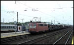 140119 fährt hier am 13.5.1995 um 14.30 Uhr mit einem Güterzug in Richtung Aachen durch den Bahnhof Düren.