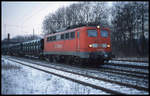 DB 140002-7 fährt hier am 1.2.2003 mit einem Röhrenzug in Richtung Osnabrück um 9.00 Uhr durch den Bahnhof Natrup Hagen.