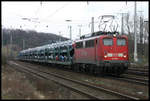 140585-1 fährt am 17.3.2005 mit einem Autotransportzug durch den Bahnhof Köln West.
