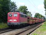 140 569 mit Auto-Leerpark durchfährt den 1991 aufgelassenen Haltepunkt Rodde bei Rheine, 21.07.15