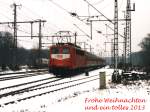 Frohe Weihnachten und ein tolles 2013! Die 141 089-3 (Einfachlampen) mit RB 62 Der Cherusker Bad Bentheim-Paderborn auf Bahnhof Bad Bentheim am 30-12-2000.