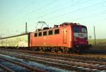 141 423 mit SE 5321 (Tostedt–Harburg) am 30.12.1998 in Klecken