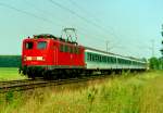 141 411 mit RB 28763 (Biblis–Graben-Neudorf) am 26.07.1999 zwischen Biblis und Bobstadt