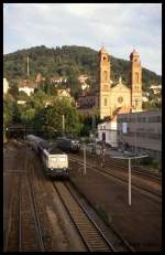 Einfahrt des E 3216 nach Heidelberg mit Zuglok 141176 am 17.8.1989 um 19.14 Uhr in den Bahnhof Eberbach am Neckar.