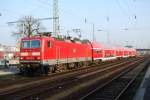 E-Lok der Baureihe 143 (143 935-5) steht mit Regional-Express nach Leipzig Hbf abfahr bereit in Cottbus Hbf.