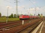 143 809 zieht ein RB in Berlin-Schnefeld.14.08.07