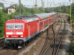 143 589-0 war erst einen Tag vorher aus dem Ausbesserungswerk  gekommen und fuhr am 21.06.06 durch Riesa.