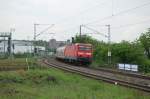 Die Stuttgarter 143 627-8 schiebt am 8.5.2010 einen RE nach Wrzburg durch den Bahnhof Stuttgart-Feuerbach.