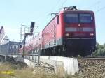 143832 hat soeben mit einer RB aus Halle(S)Hbf die Elbbrcke bei Lutherstadt Wittenberg pasiert.