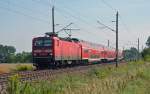 143 095 befrderte am 04.08.12 eine RB aus Bitterfeld kommend durch Kyhna Richtung Halle(S).
