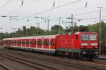 143 823 am 2.7.13 mit einer S6 in Dsseldorf-Rath.