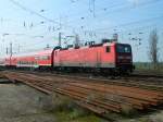 143 011 mit RB26412 nach Leipzig-Hbf bei der Einfahrt in Großkorbetha am 26.03.2014
