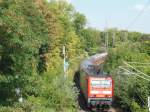 143 818 mit dem Regionalexpress nach Cottbus an der Kurve nach Leipzig-Thekla  18.09.2012