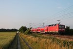 Nachschuss auf die Freiburger 143 972 am 11.06.2015, als sie den HVZ-Verstärker (Neuenburg (Baden) - Freiburg (Brsg) Hbf) in kürze in Buggingen an den Bahnsteig fuhr.