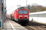 143 180, eine der wenigen 143er ohne Kontrollziffer an der Front, fhrt am 14.03.09 mit der RB nach Lutherstadt Wittenberg in Burgkemnitz ein.