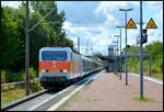 HanseSail 2026: Intertourex 143 175-8 mit dem Sonderzug DZ 88300 Leipzig - Warnem�nde am 08.08.2026 bei der Durchfahrt in Rostock Lichtenhagen.