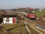 MEG 604 (91 80 6143 257-4 D-MEG]) und 247 042 zogen am 19.03.15 einen Zementzug durch Jößnitz.