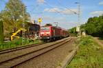 143 568 in Jüchen mit einem RB27 am Bü Kölner Straße gen Rheydt fahrend. 9.5.2017