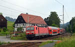 143 841 führte am Morgen des 15.06.19 eine S-Bahn nach Bad Schandau durch Strand.