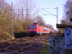 143 118-8 mit der RB nach Itzehoe kurz vor Elmshorn. 23.03.08