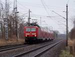 143 305-1 fhrt hier mit der RB14 (Senftenberg-> Berlin Schnefeld Flughafen) bei Ragow. Dieser Ort liegt zwischen Lbbenau und Lbben. 28.02.2009