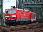 Die S6 gezogen von 143 304-4 nach Kln Nippes auf dem Weg von der Hohenzollernbrcke in den Klner Hbf.