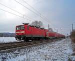 143 313 mit RE4107 in Singlis, 21.2.010. Planmig werden die RE's der Linie 30 mit 111 bespannt.