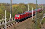 143 002 zieht am 25.04.10 eine RB nach Leipzig durch Holzweissig.